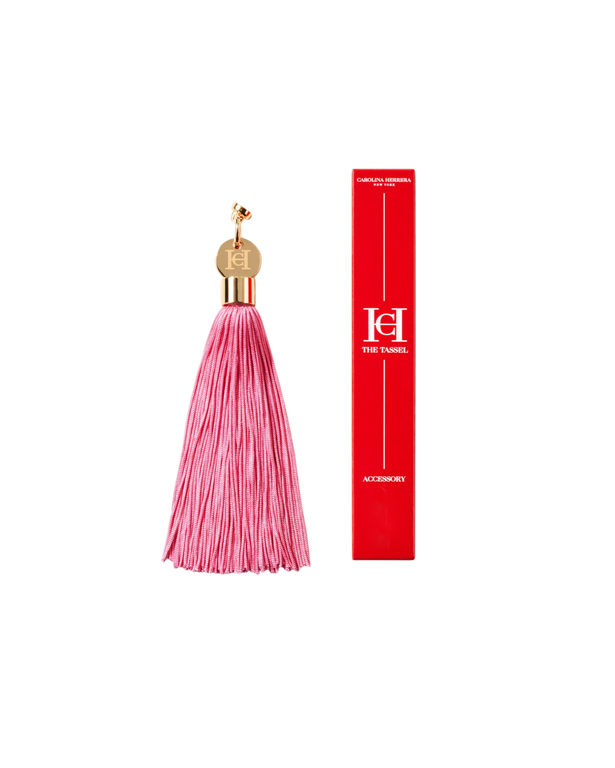 Розовая кисточка-подвеска с магнитным креплением для футляра помады, Carolina Herrera, $30