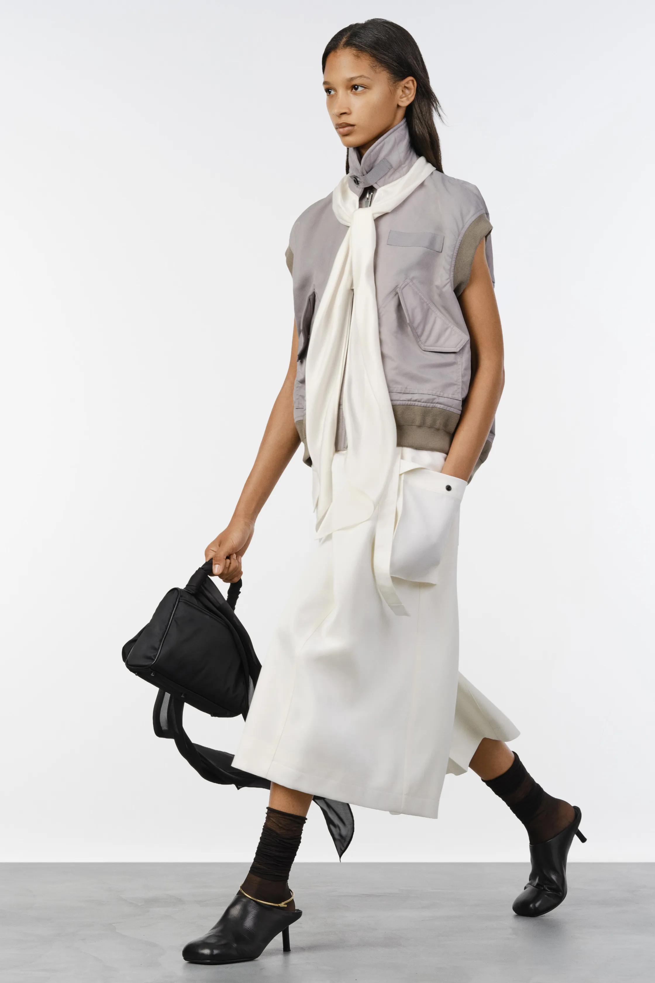 00035-sacai-resort-2027-credit-brand.jpg